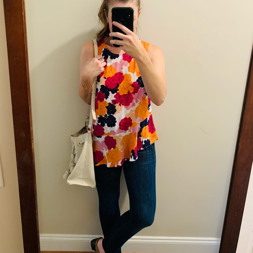 Asymmetrical, floral tank.